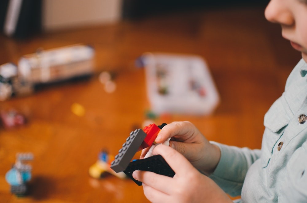child exploring sensory touch